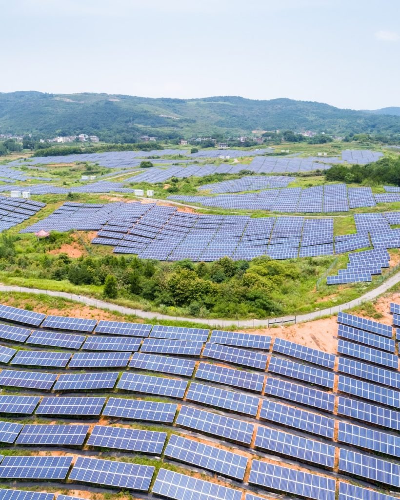 solar-power-station-on-hillside-aerial-view-of-renewable-energy.jpg